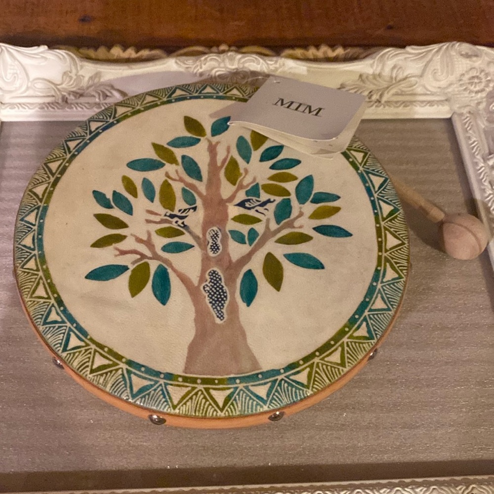 Tree Of Life Frame Drum. Cones with one xBallStick. Measures 9 1/2”